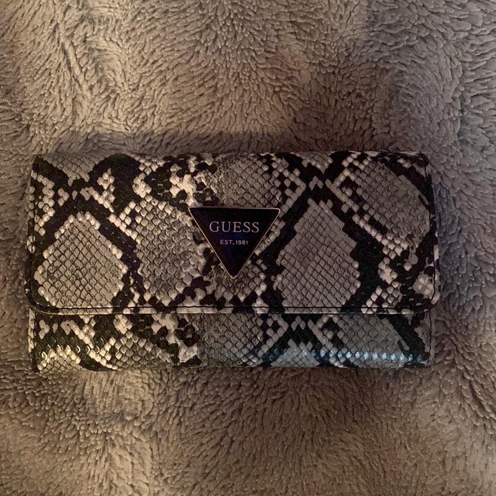Guess wallet, black grey white, loads of space.